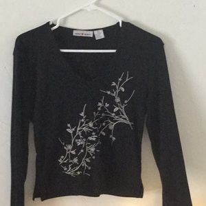 Black embroidered shirt.